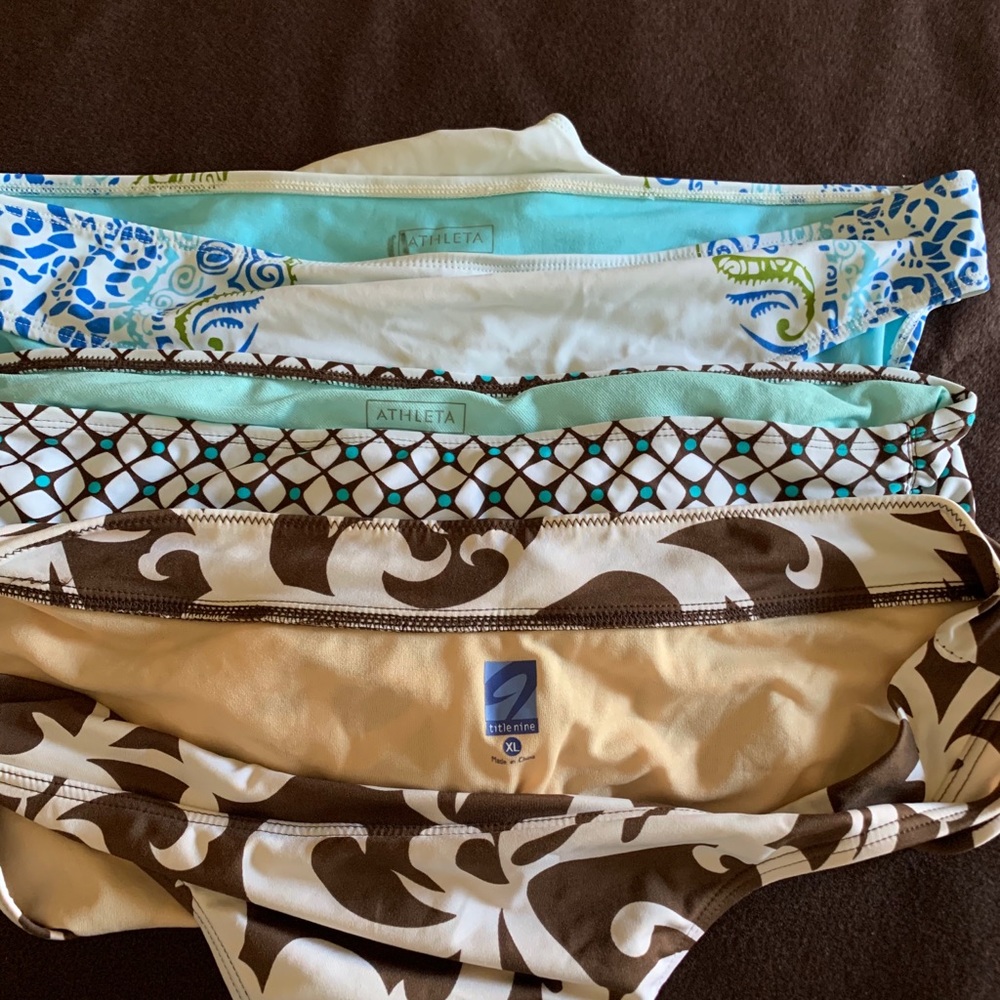 Three Athleta bikini bottoms. Never worn